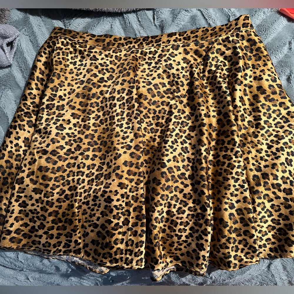 NWT. Francesca’s Leopard Print Skirt. Size: XL
